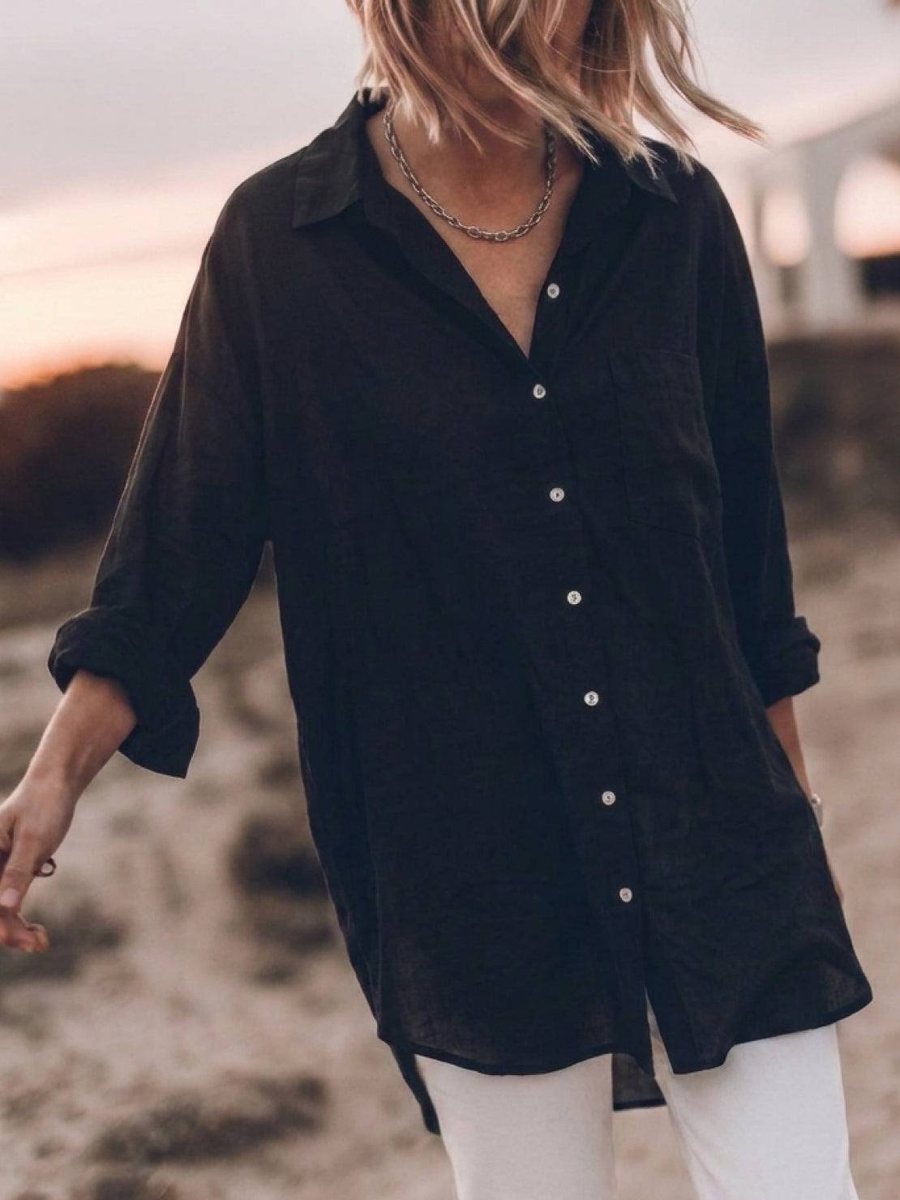 The relaxed cotton-linen shirt worn with the sleeves rolled and the hem untucked