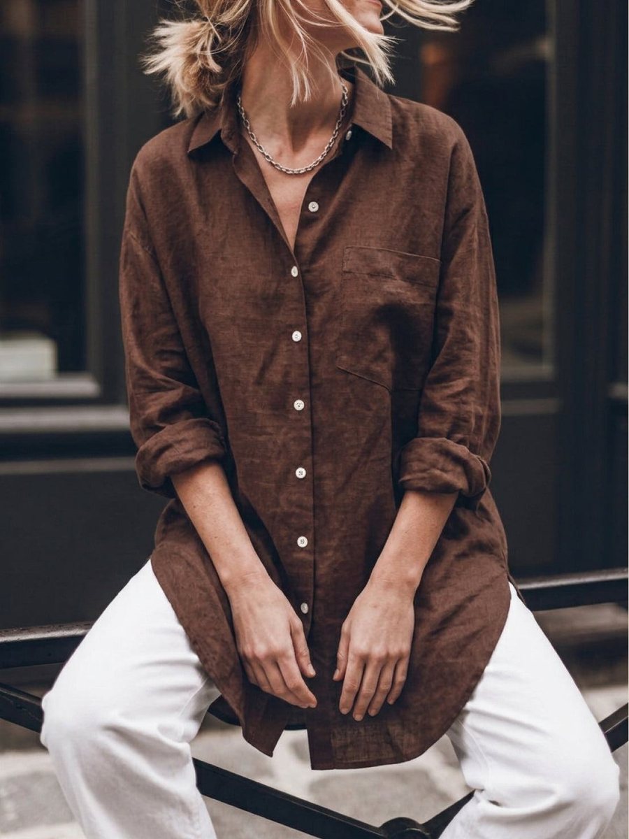Untucked and rolled to the elbow, over wide linen trousers, for most days.
